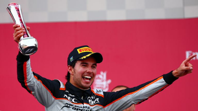 BAKU, AZERBAIJAN - JUNE 19:  Sergio Perez of Mexico and Force India celebrates on the podium after finishing third during the European Formula One Grand Pr