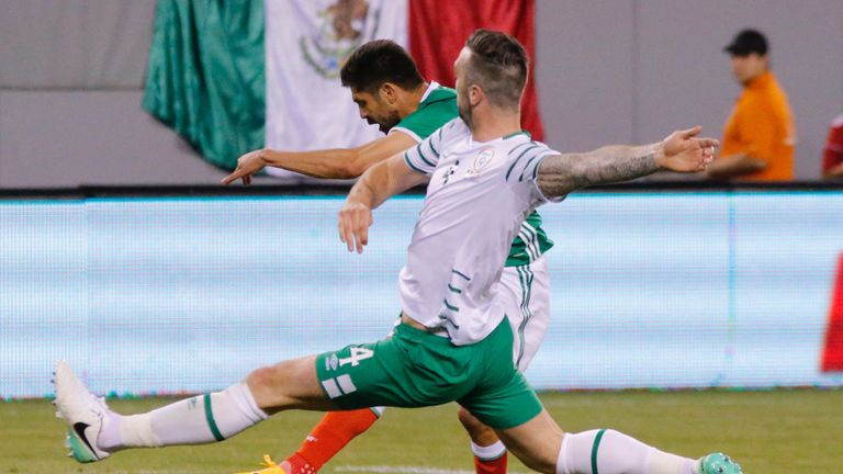 Mexico's Oribe Peralta (19) drives the ball past Ireland's Shane Duffy (4) during the friendly match between Mexico and the Republic of Ireland on June 1, 