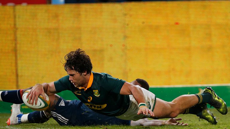 South Africa's center Jan Serfontein scores a try  during the first rugby union Test match between South Africa and France at the Loftus Versfeld Arena in 