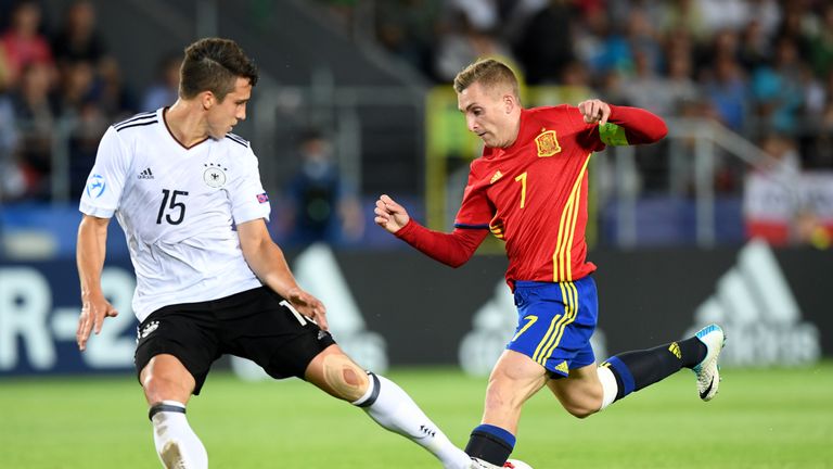 Germany's defender Marc-Oliver Kempf (L) and Spain's midfielder Gerard Deulofeu vie for the ball during the UEFA U-21 European Championship football final 