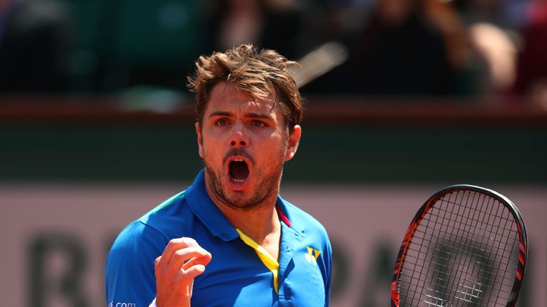 Stan Wawrinka celebrates a point during his French Open semi-final against Andy Murray at Roland Garros