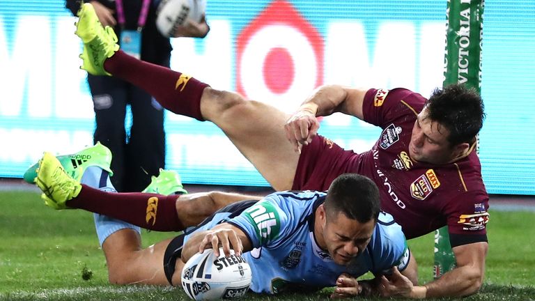 Jarryd Hayne forcing his way over the try-line
