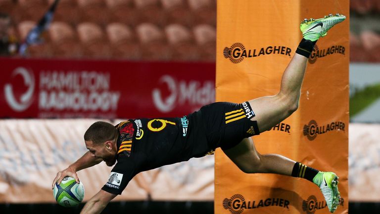 Tawera Kerr-Barlow of the Chiefs dives over for a try during the Round 15 Super Rugby match 