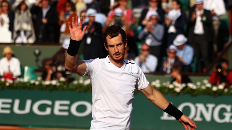Andy Murray of Great Britain celebrates victory following the men's singles quarter finals match against Kei Nishikori of Japan