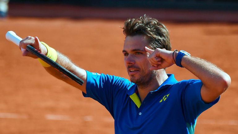 Switzerland's Stanislas Wawrinka celebrates after winning against Britain's Andy Murray their semifinal tennis match at the Roland Garros 2017 French Open