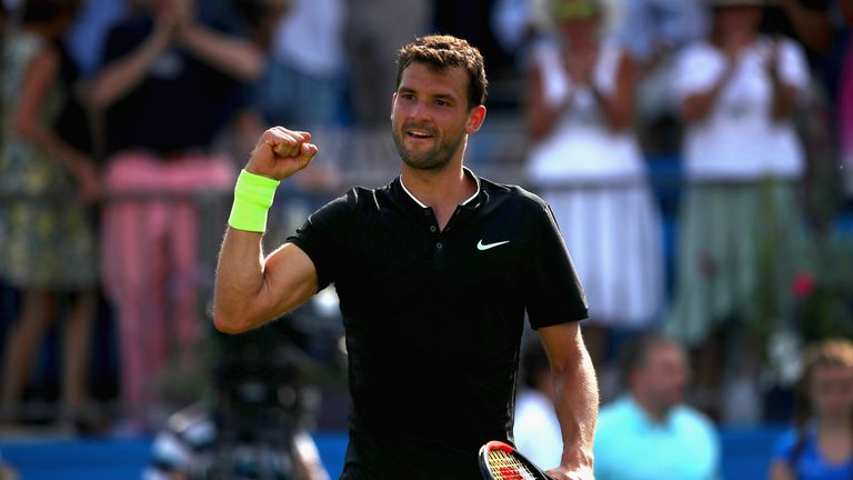 Grigor Dimitrov of Bulgaria celebrates victory following the mens singles second round match against Julien Benneteau of France