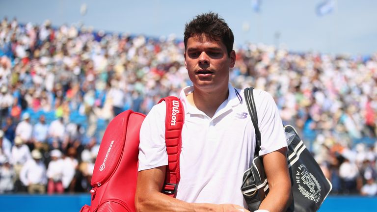 Milos Raonic of Canada leaves the court following defeat in the mens singles first round match against Thanasi Kokkinakis