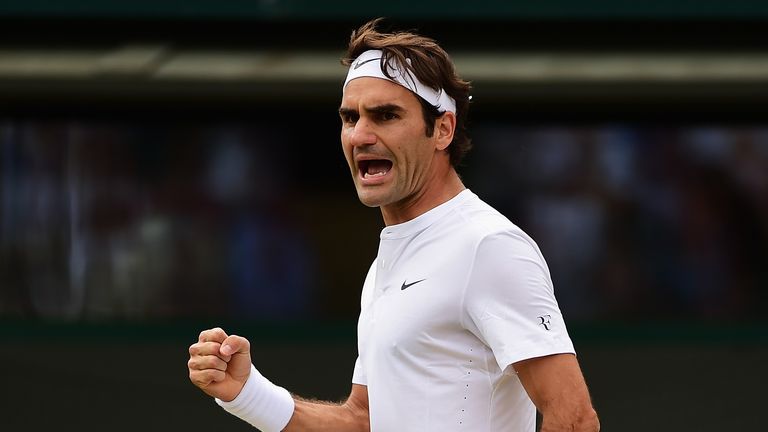 Roger Federer of Switzerland celebrates winning his Gentlemens Singles Quarter Final match against Gilles Simon of France