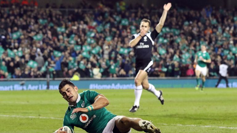 Ireland's full-back Tiernan O'Halloran scores their third try during the rugby union test match between Ireland and Canada at the Aviva stadium in Dublin o