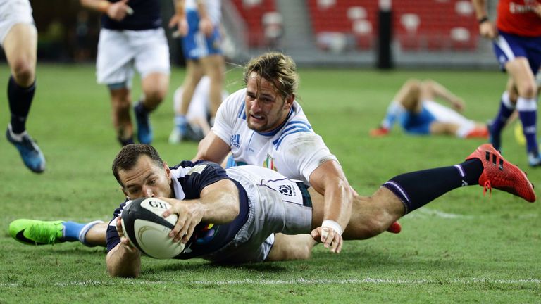 SINGAPORE - JUNE 10:  Tim Visser of Scotland scores a try during the International Test match between Italy and Scotland at Singapore Sports Stadium 