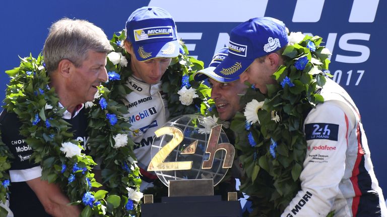 Porsche's Timo Bernhard, Earl Bamber and  Brendon Hartley celebrate on the podium