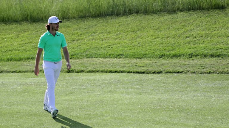 HARTFORD, WI - JUNE 15:  Tommy Fleetwood of England walks across the 12th green during the first round of the 2017 U.S. Open at Erin Hills on June 15, 2017