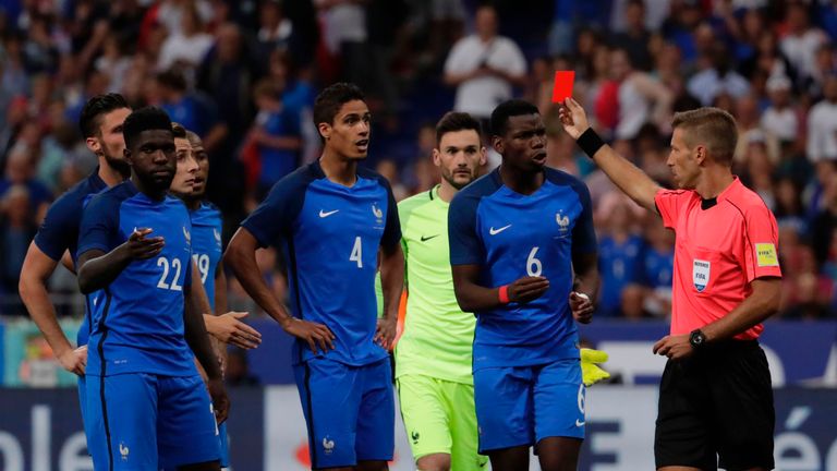 France's Raphael Varane was shown red against England after video assistance 