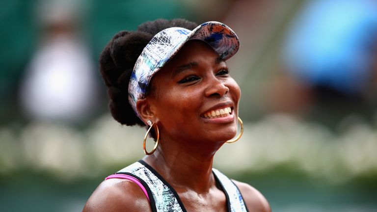 PARIS, FRANCE - JUNE 02:  Venus Williams of The United States reacts whilst being interviewed following victory in the ladies singles third round match aga