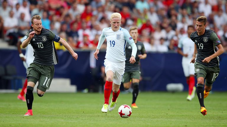 England's Will Hughes runs through Germany's Maximilian Arnold (left) and Janik Haberer 