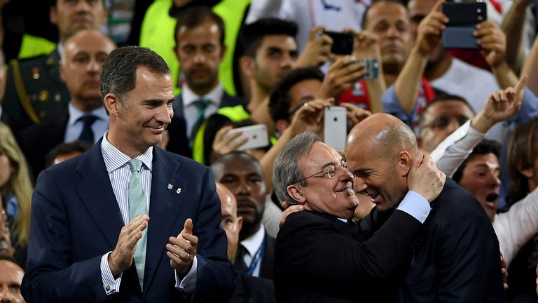 MILAN, ITALY - MAY 28: King Felipe VI of Spain looks on as Head coach Zinedine Zidane of Real Madrid is congratulated on winning the Champions League by Re