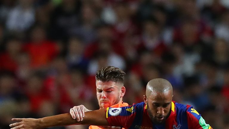 Alberto Moreno competes with Andros Townsend