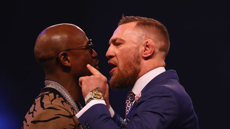 Floyd Mayweather Jr. and Conor McGregor come face to face during the Floyd Mayweather Jr. v Conor McGregor World Press Tour at Wembley, London