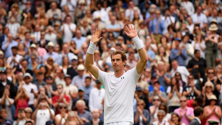 Andy Murray of Great Britain acknowledges the crowd as he celebrates victory after the Gentlemen's Singles first round