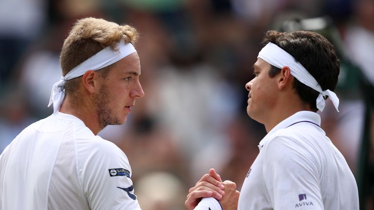 LONDON, ENGLAND - JULY 04:  Jan-Lennard Struff of Germany and Milos Raonic of Canada shake hands after their Gentlemen's Singles first round match on day t