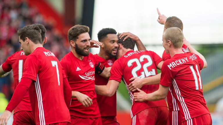 The Aberdeen players celebrate Ryan Christie's (third from right) goal