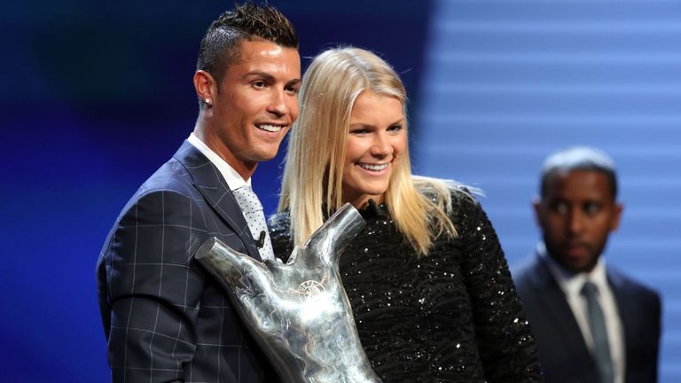 Real Madrid's Cristiano Ronaldo (L) poses with Lyon's Norway forward Ada Hegerberg in Monaco