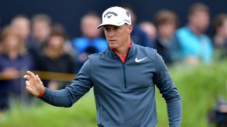 SOUTHPORT, ENGLAND - JULY 20:  Alex Noren of Sweden waves to the crowd after a birdie on the 1st hole during the first round of the 146th Open Championship
