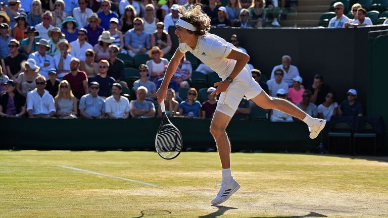 Germany's Alexander Zverev serves to Austria's Sebastian Ofner during their men's singles third round match on the sixth day of the 2017 Wimbledon Champion