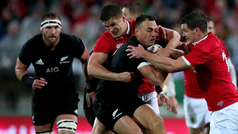  Lions' Owen Farrell and Jonathan Sexton tackle Israel Dagg of New Zealand All Black
