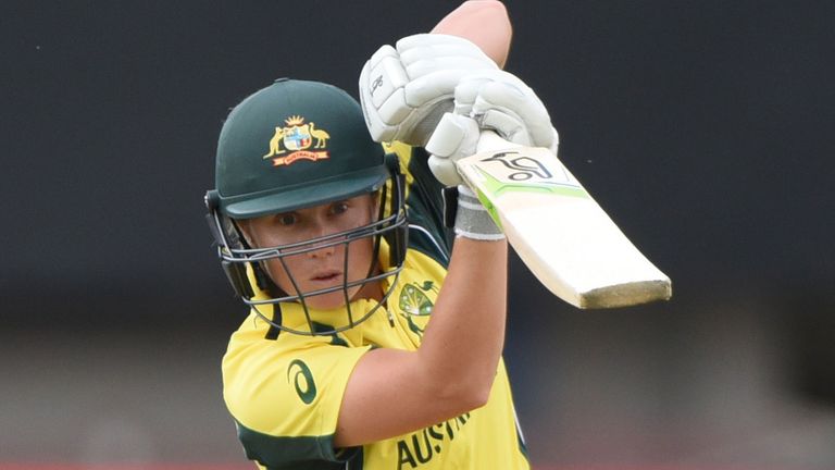 Australia's Alyssa Healy drives through the off-side