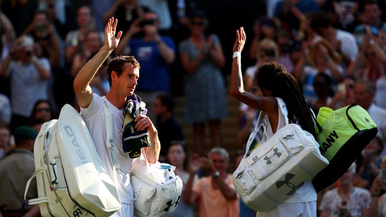 LONDON, ENGLAND - JULY 05: Both Andy Murray of Great and Dustin Brown of Germany acknowledge the crowd after their Gentlemen's Singles second round match o