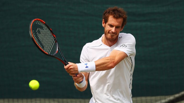 Andy Murray of Great Britain plays a backhand during practice ahead of Wimbledon Lawn Tennis Championships