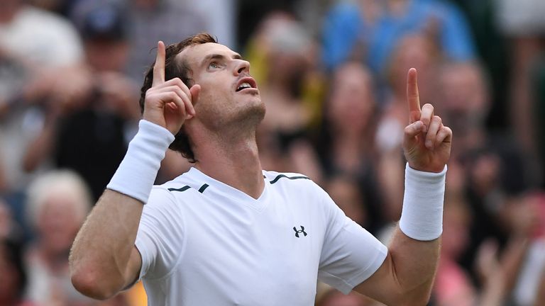 Britain's Andy Murray celebrates beating Italy's Fabio Fognini during their men's singles third round match on the fifth day of the 2017 Wimbledon Champion