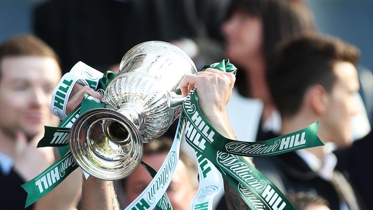 GLASGOW, SCOTLAND - MAY 21: Anthony Stokes of Hibernian lifts the cup following the Scottish Cup Final between Rangers and Hibernian at Hampden Park