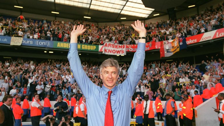 LONDON, ENGLAND - APRIL 25:  Manager Arsene Wenger celebrates Arsenal winning the Premier League after the match between Tottenham and Arsenal at White Har