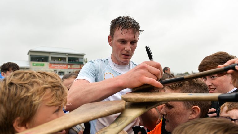  Austin Gleeson of Waterford signs hurleys for young fans following the match between Offaly and Waterford