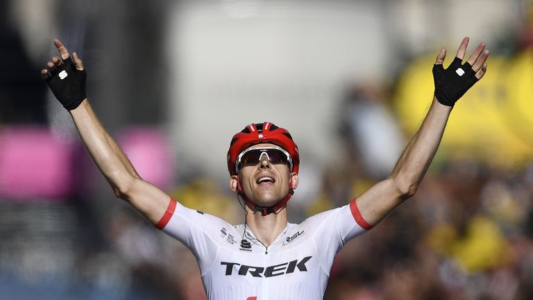 Bauke Mollema celebrates as he crosses the finish line at the end of stage 15