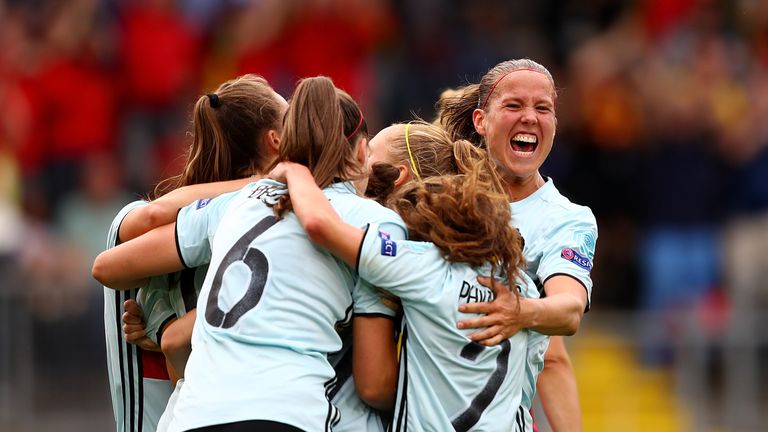 BREDA, NETHERLANDS - JULY 20:  Janice Cayman of Belgium celebrates with team mates after scoring her team's second goal of the game during the UEFA Women's
