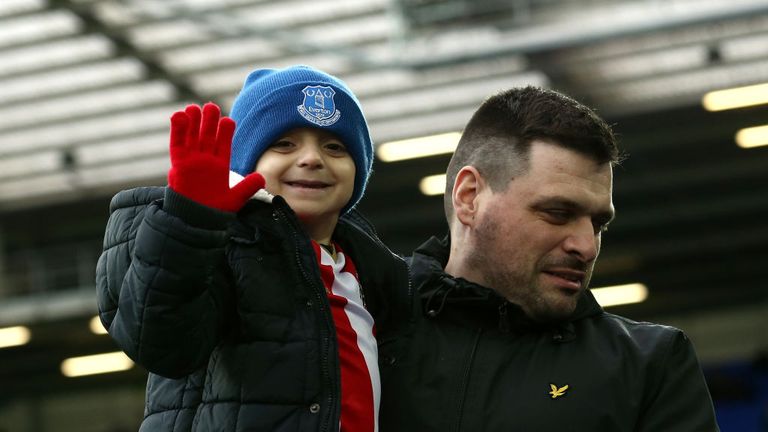 Bradley Lowery (L) with his  father Carl at Goodison Park in February 