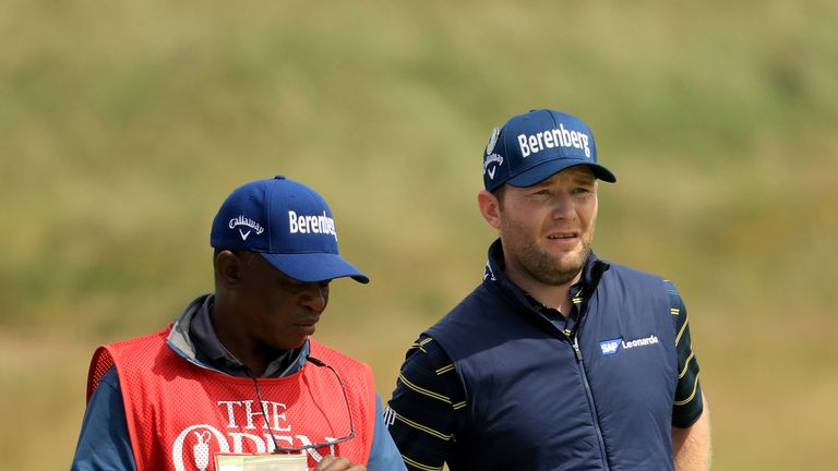 SOUTHPORT, ENGLAND - JULY 22:  Branden Grace of South Africa with his caddie Zak Rasego on the 16th fairway during the third round of the 146th Open Champi