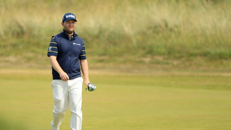 SOUTHPORT, ENGLAND - JULY 22:  Branden Grace of South Africa walks down the 16th fairway during the third round of the 146th Open Championship at Royal Bir