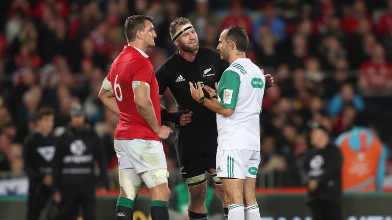 British and Irish Lions captain Sam Warburton and New Zealand captain Kieran Read talk with referee Romain Poite during the third test of the 2017 British 