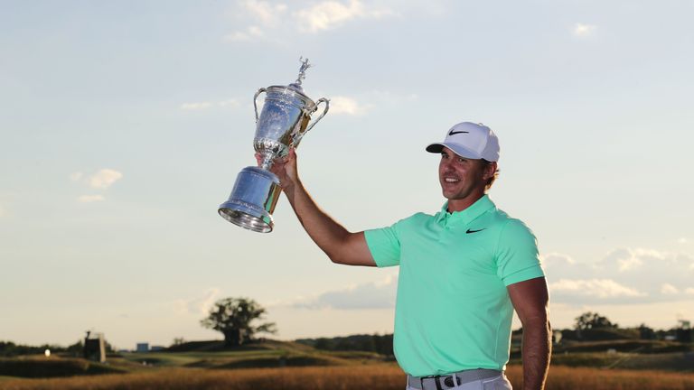 HARTFORD, WI - JUNE 18:  Brooks Koepka of the United States poses with the winner's trophy after his victory at the 2017 U.S. Open at Erin Hills on June 18