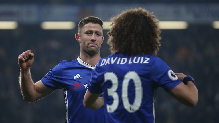 Chelsea's English defender Gary Cahill (L) celebrates with Chelsea's Brazilian defender David Luiz 