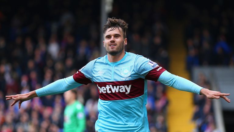 LONDON, ENGLAND - OCTOBER 17:  Carl Jenkinson of West Ham United celebrates scoring his team's first goal during the Barclays Premier League match between 