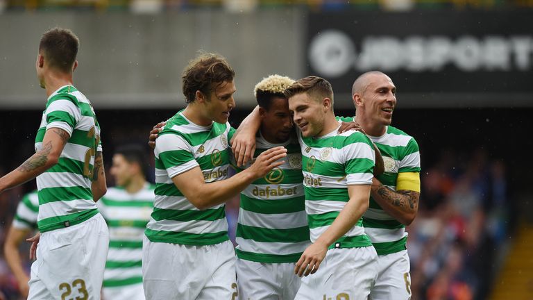 BELFAST, NORTHERN IRELAND - JULY 14: Scott Sinclair (3rd L) of Celtic celebrates with team mates after scoring during the Champions League second round fir