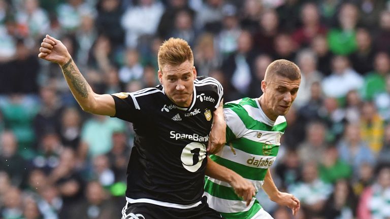 Rosenborg's Nicklas Bendtner (left) battles with Celtic's Jozo Simunovic, Champions League qualifying