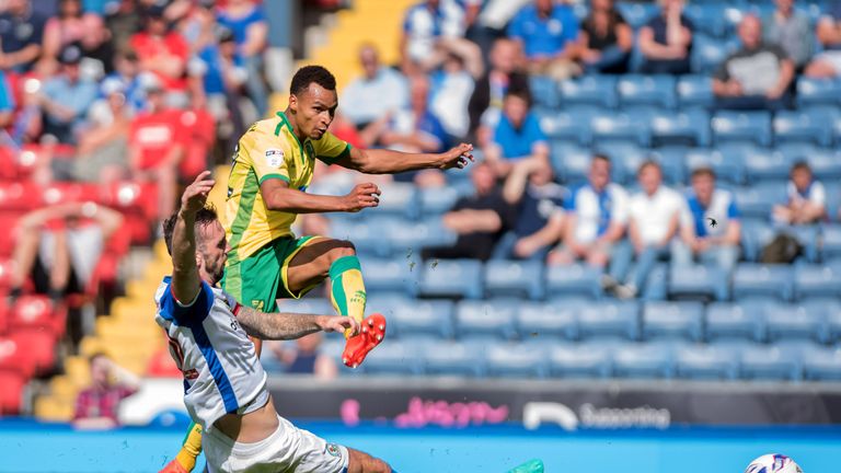 BLACKBURN, ENGLAND - AUGUST 06: Jacob Murphy of Norwich City is tackled by Shane Duffy of Blackburn Rovers during the Sky Bet Championship match between Bl