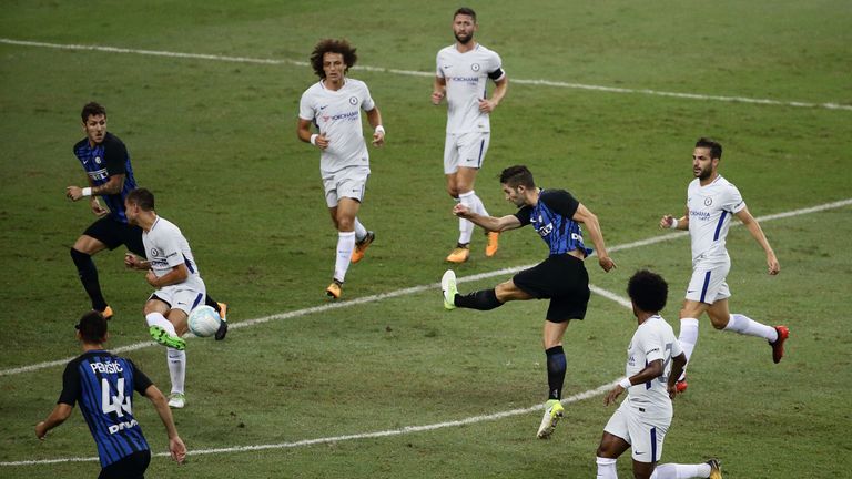 SINGAPORE - JULY 29: Roberto Gagliardini (3rd R) of FC Internazionale shoots at goal during the International Champions Cup match between FC Internazionale