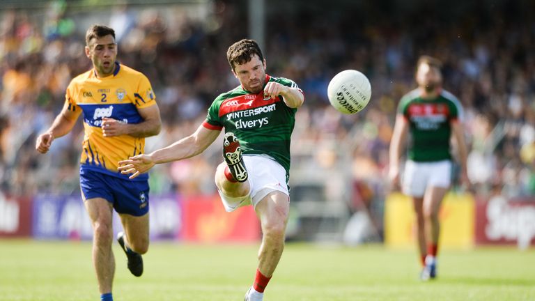 Chris Barrett of Mayo in action against Dean Ryan of Clare during the GAA Football All-Ireland Senior Championship Round 3A match